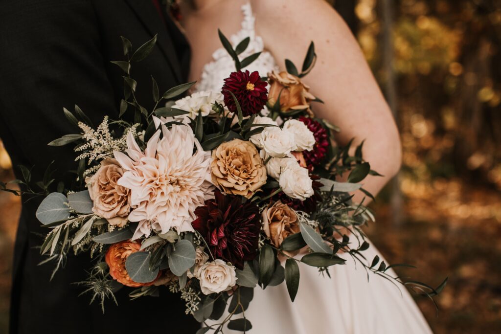 fall bridal bouquet with dahlias and toffee roses 