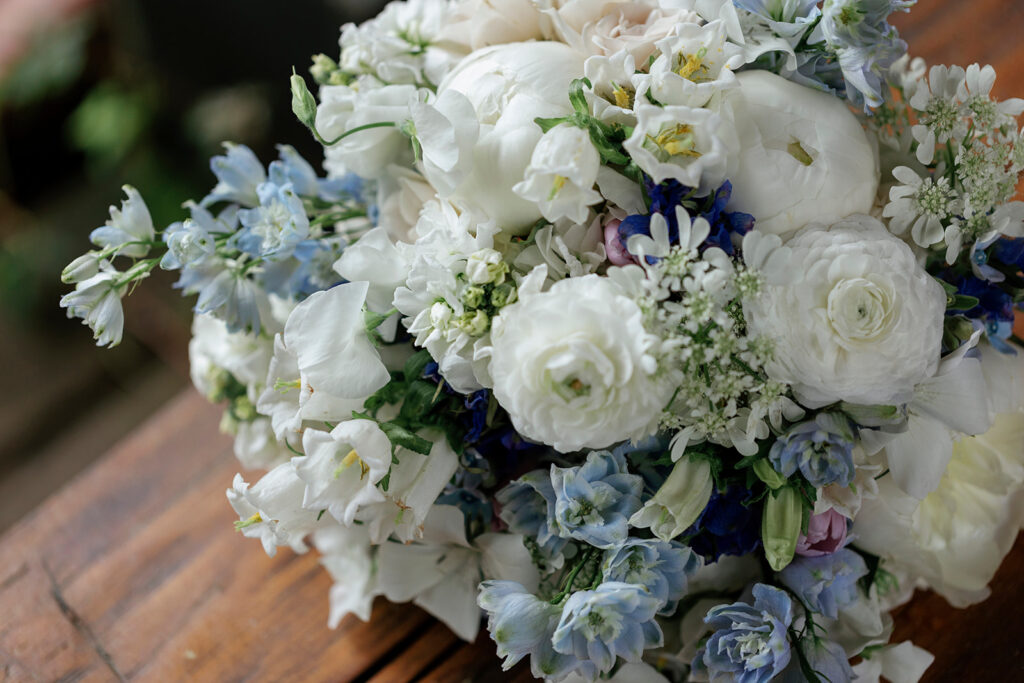 spring bridal bouquet in vermont in shades of whites and blues. 